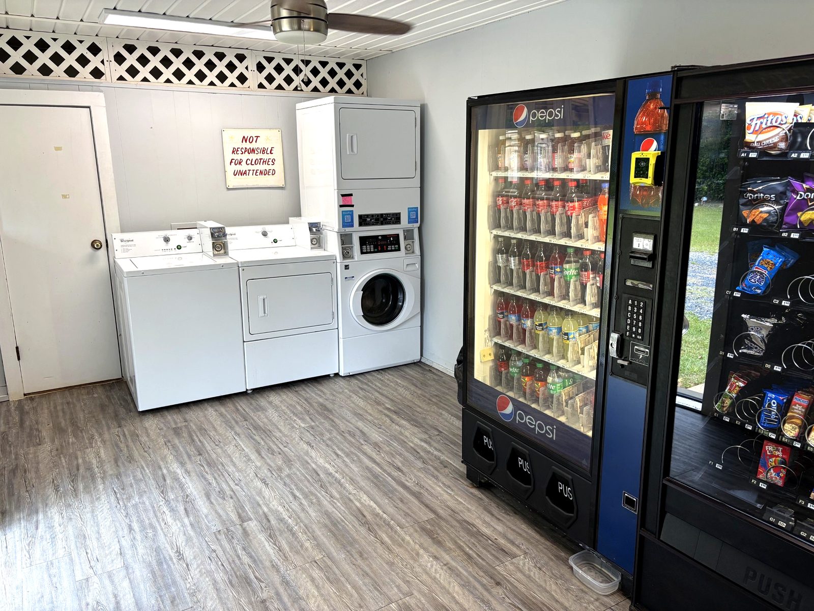 Laundry room with washers, dryers and vending machines at Dogwood Ridge RV Park