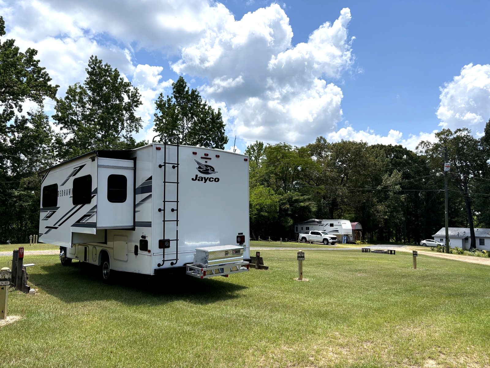 RVs parked in shaded sites at Dogwood Ridge RV Park Natchitoches Louisiana